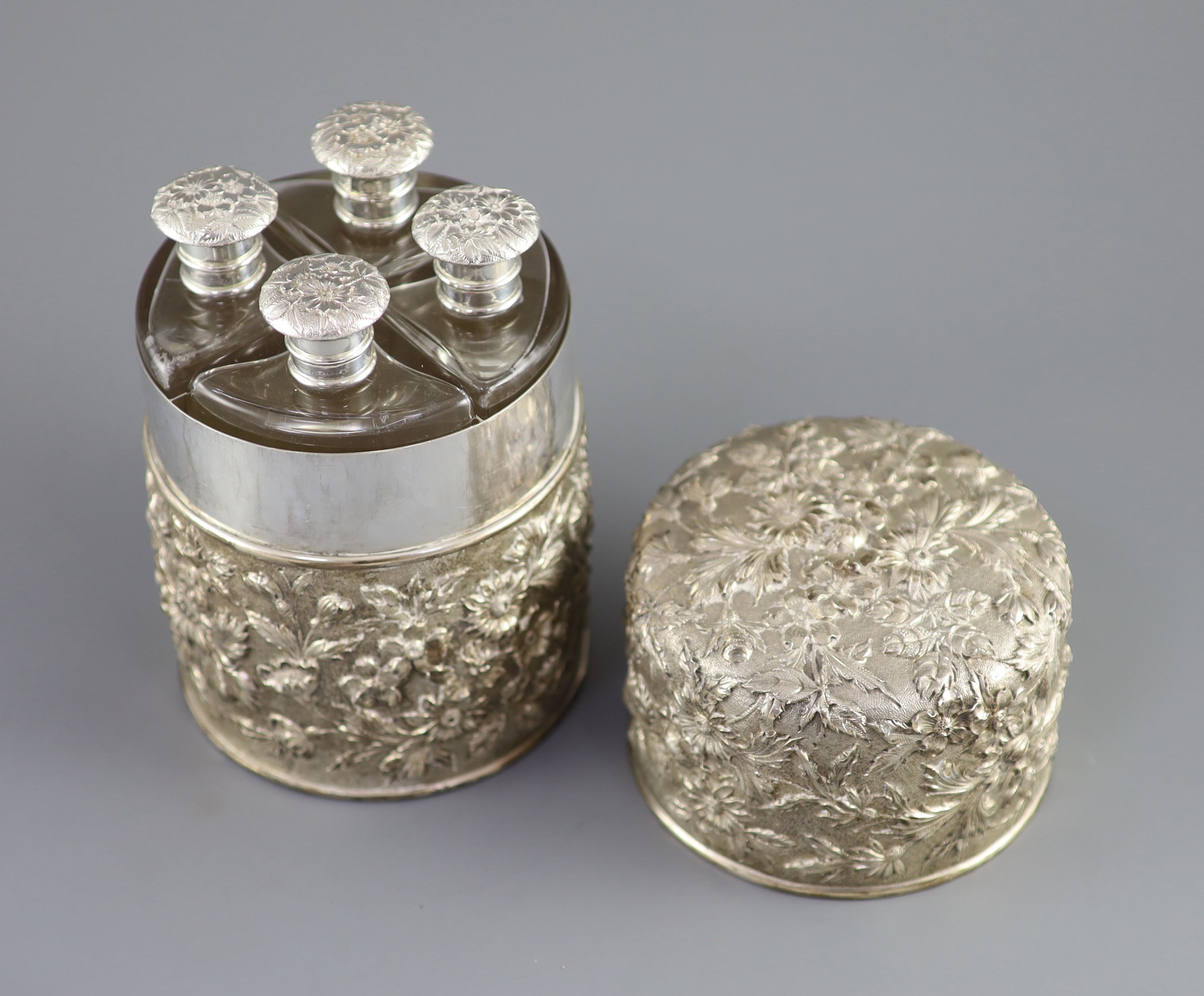 A cased late 19th/early 20th century American S.Kirk & Son Co. embossed sterling silver cylindrical scent canister